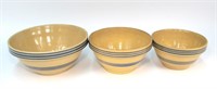 Lot, three yellow ware mixing bowls,