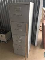 Filing cabinet. Four drawers. Brand is HON.