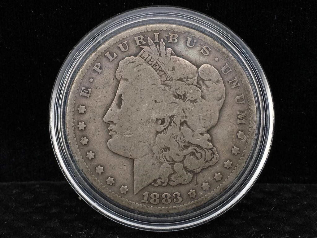 1883 Morgan Silver Dollar in case