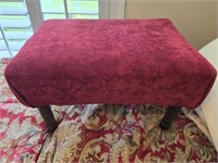 Red upholstered stool