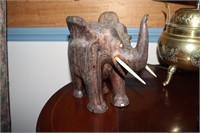 Hand carved wooden elephant (heavy) has one broken