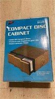 Stackable compact disc cabinet with three