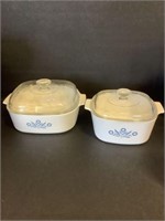 2 pyrex casserole dishes w covers 10" & 12"