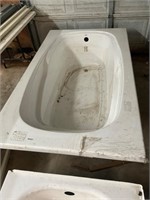Bathtub- plastic- never installed- sizes in pics