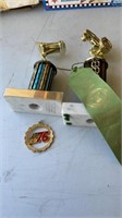 Lot of trophies and 1976 medal