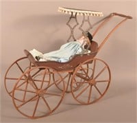 Antique Doll Stroller with Period Doll.