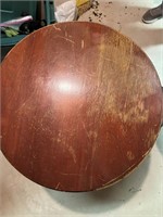 TWO BROWN ROUND TABLES
