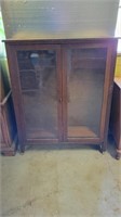 Antique glass door bookcase with 4 shelves