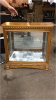 Small curio cabinet lighted