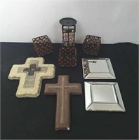 group of candle holders and wall decor with