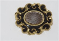 Large Victorian gilt and enamel mourning brooch