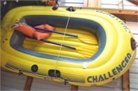 Inflatable boat, paddles, life jacket