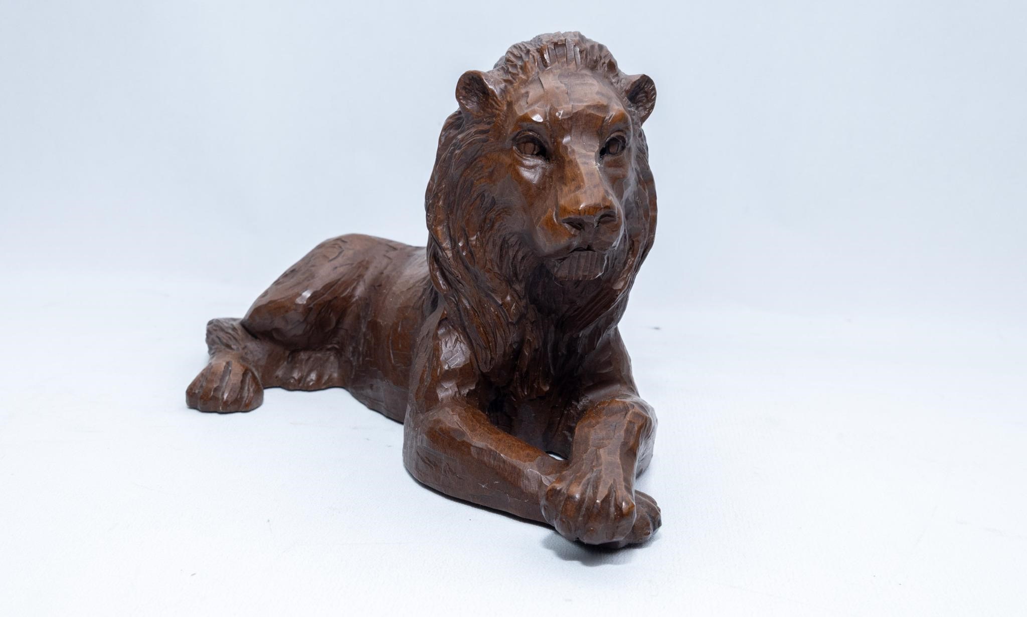 Red Mill Mfg. handcrafted pecan resin figural lion