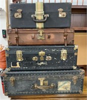 Four Stackable Vintage Suitcases
