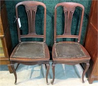 Pair of two oak owl-eye side chairs