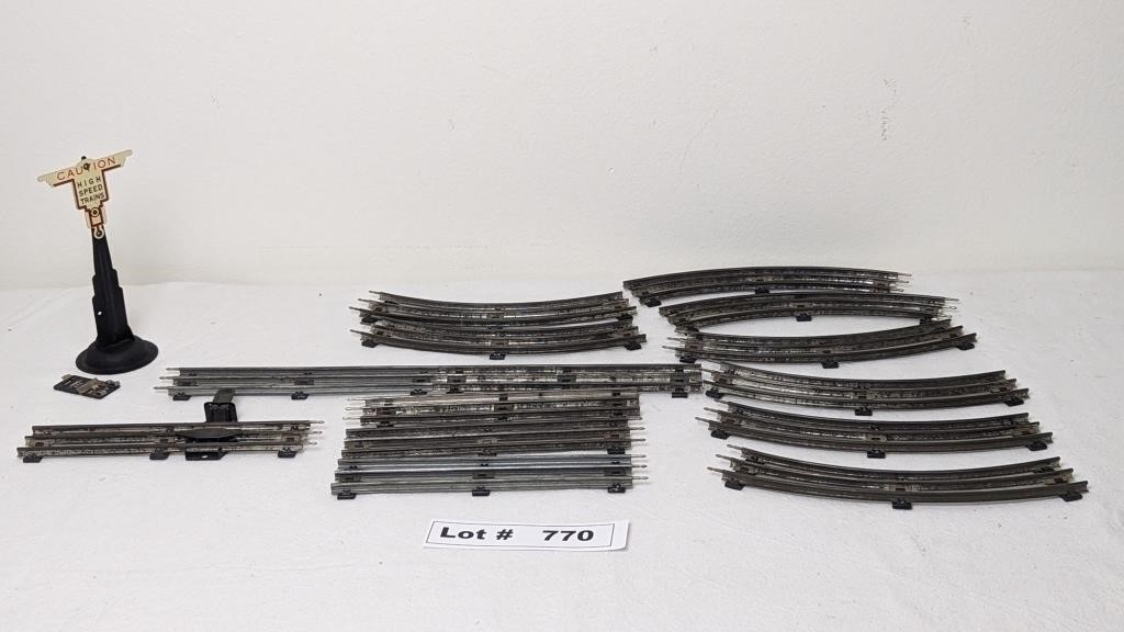 LIONEL METAL TRAIN TRACKS AND SIGN