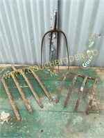 Antique pitch fork, garden rake, and more