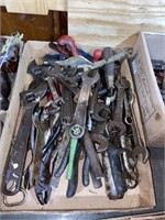assorted tools including adjustable wrenches
