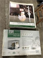 Dog Crate & Snowman Decoration.