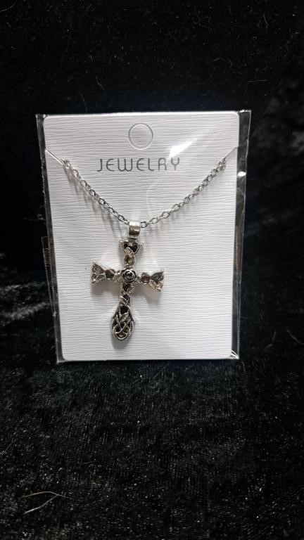 New in package Silver tone cross necklace