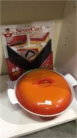 Orange enamel metal cook pot with lid, never