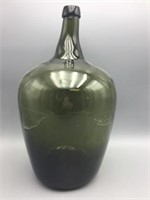 Large blown green Demijohn bottle