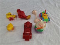 Rooster, Firetruck, And Other Plastic Toys