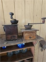 Pair of antique coffee grinders wood