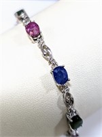 $900 Silver Emerald Ruby Sapphire Bracelet (~weigh