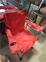 Is new red folding camp chair