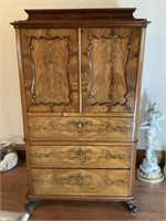 Antique server with hand carvings. 63H x 36W