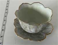 Decorative tea cup and saucer