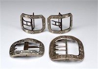 Four antique silver buckles