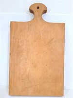 Wood cutting board with handle