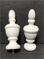 Two white wooden finials