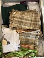 Drawer of assorted placemats and kitchen towels