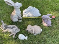 R lawn Rabbits and One Bird.  White rabbit is