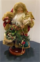 Santa Claus decor measuring 16 inches tall on a