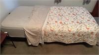 Single Glideaway electric bed with sheets