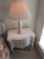 French provincial nightstand and lamp.