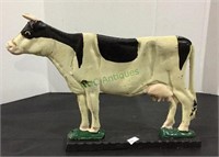 Larger cast-iron cow doorstop measuring 9 inches