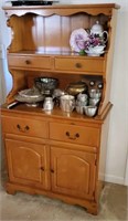 Small kitchen hutch has 4 drawers and 2 doors no