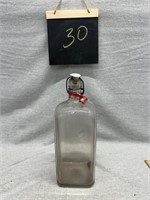 Old square bottle with porcelain stopper