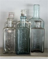 Lot #4338 - (8) antique druggist bottles by