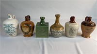 6 ASSORTED STONEWARE DECANTERS INCLUDES