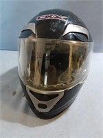 A black ATV Helmet has eye protecter that can