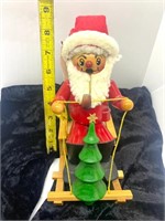 Santa on Sled Steinbach  Music box