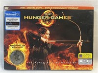 NIB Hunger Games DVD & Mockingjay Pendant