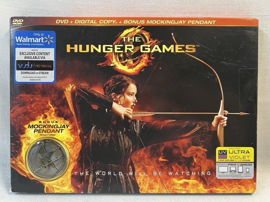 NIB Hunger Games DVD & Mockingjay Pendant