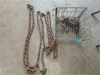 Assorted sizes and lengths of chain in metal crate